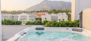 Luxury Beachside Penthouse with Rooftop Jacuzzi in Marbella
